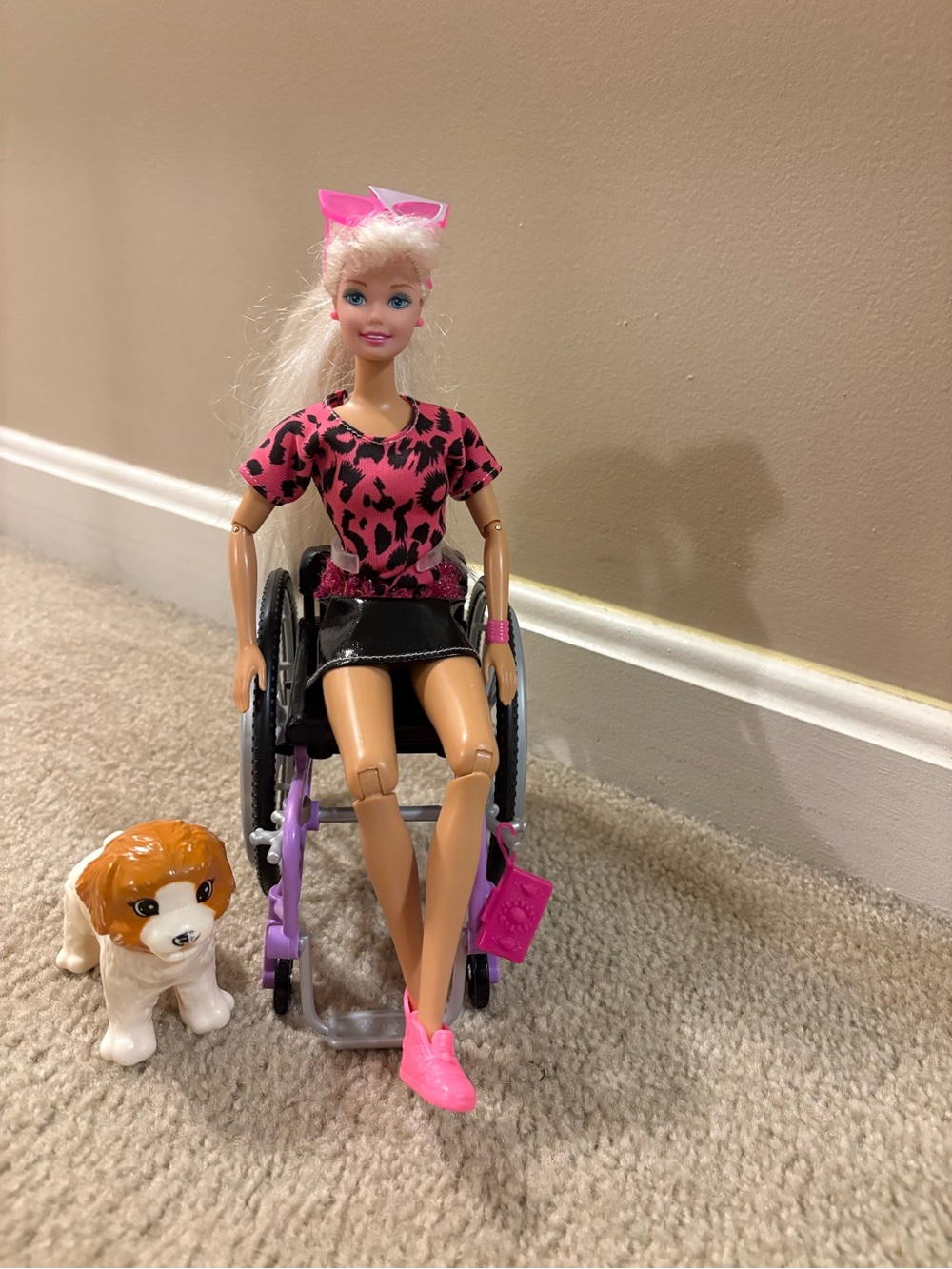 Barbie with Wheelchair in Pink Leopard with Brown-and-White Puppy